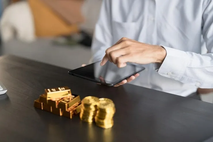 gold-trading-business-man-hand-offering-gold-investment-gold-mining-company-trading-gold-stock-exchange-rising-gold-prices_1715-25300.jpg Yazan al Homsi: A Key Player in Clean-Tech and Healthcare Investments
